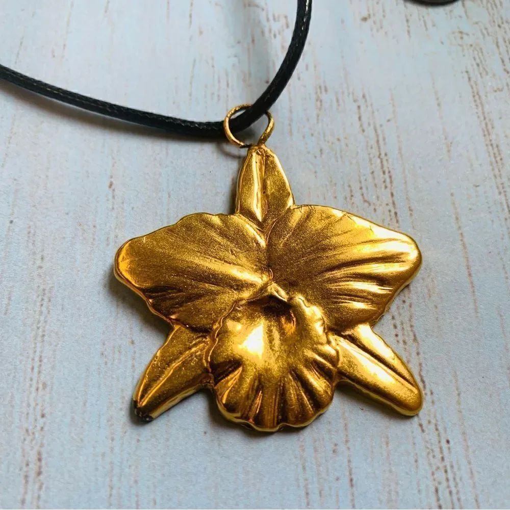 Gold Lily Pendant Black Cord Necklace